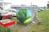Stationshäuschen während des Besprühens.